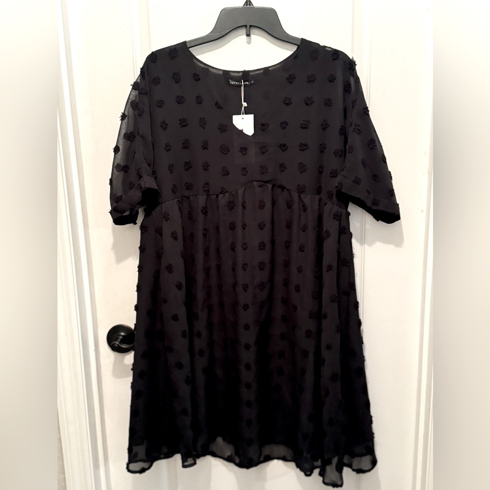 NWT baby doll dress in Large.